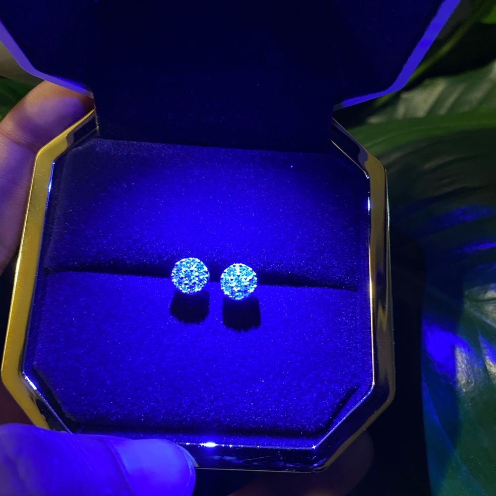 .999 silver VS diamond cluster earrings.